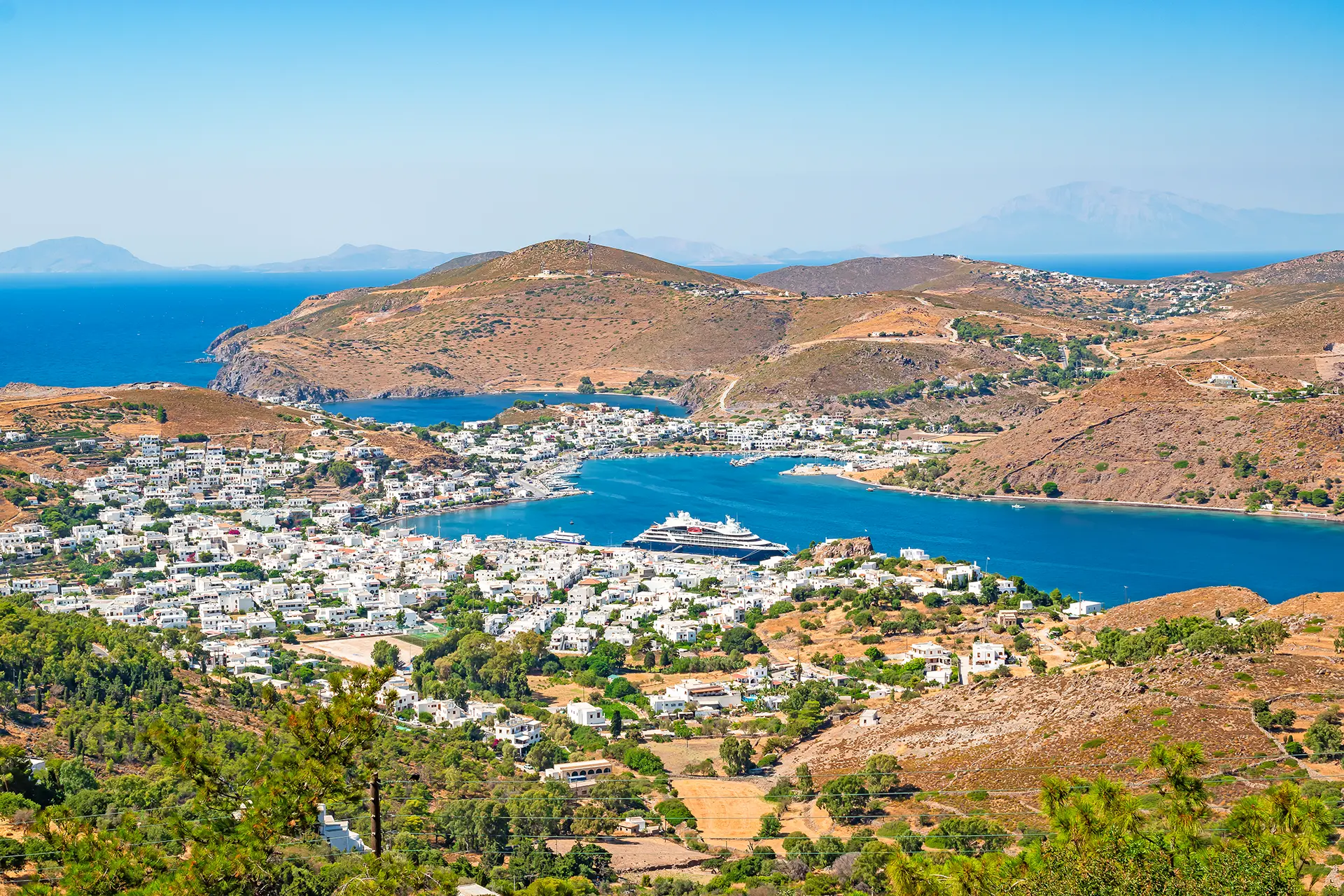 Patmos island, Greece — the sacred island of Saint John with hilltop monasteries and whitewashed villages.
